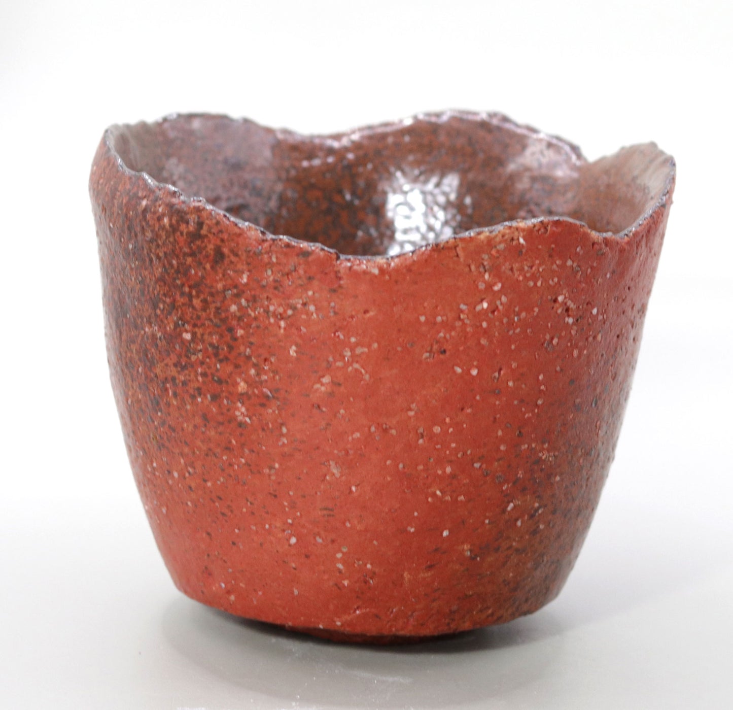 Powerful presence Red Concave Tea Bowl by Nishihata Tadashi