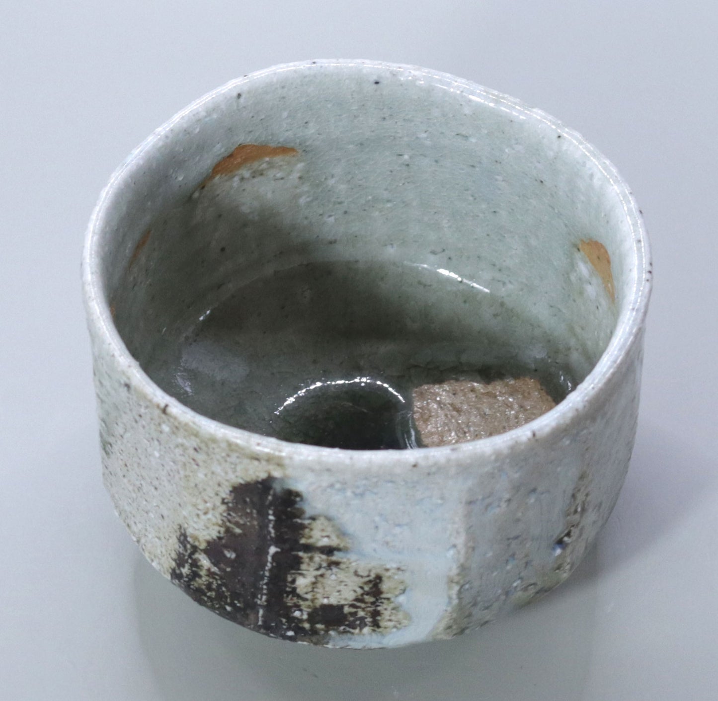 Commanding presence ash-glazed tea bowl by Nishihata Tadashi