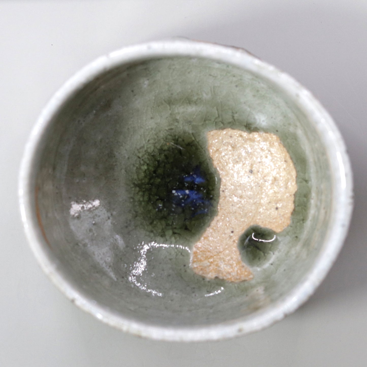 Commanding presence ash-glazed tea bowl by Nishihata Tadashi