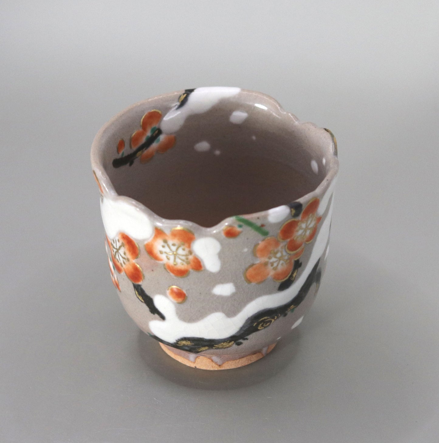 37. A copy of Kenzan's Snow-covered Plum Blossom Sake Cup by Kosai Miyagawa