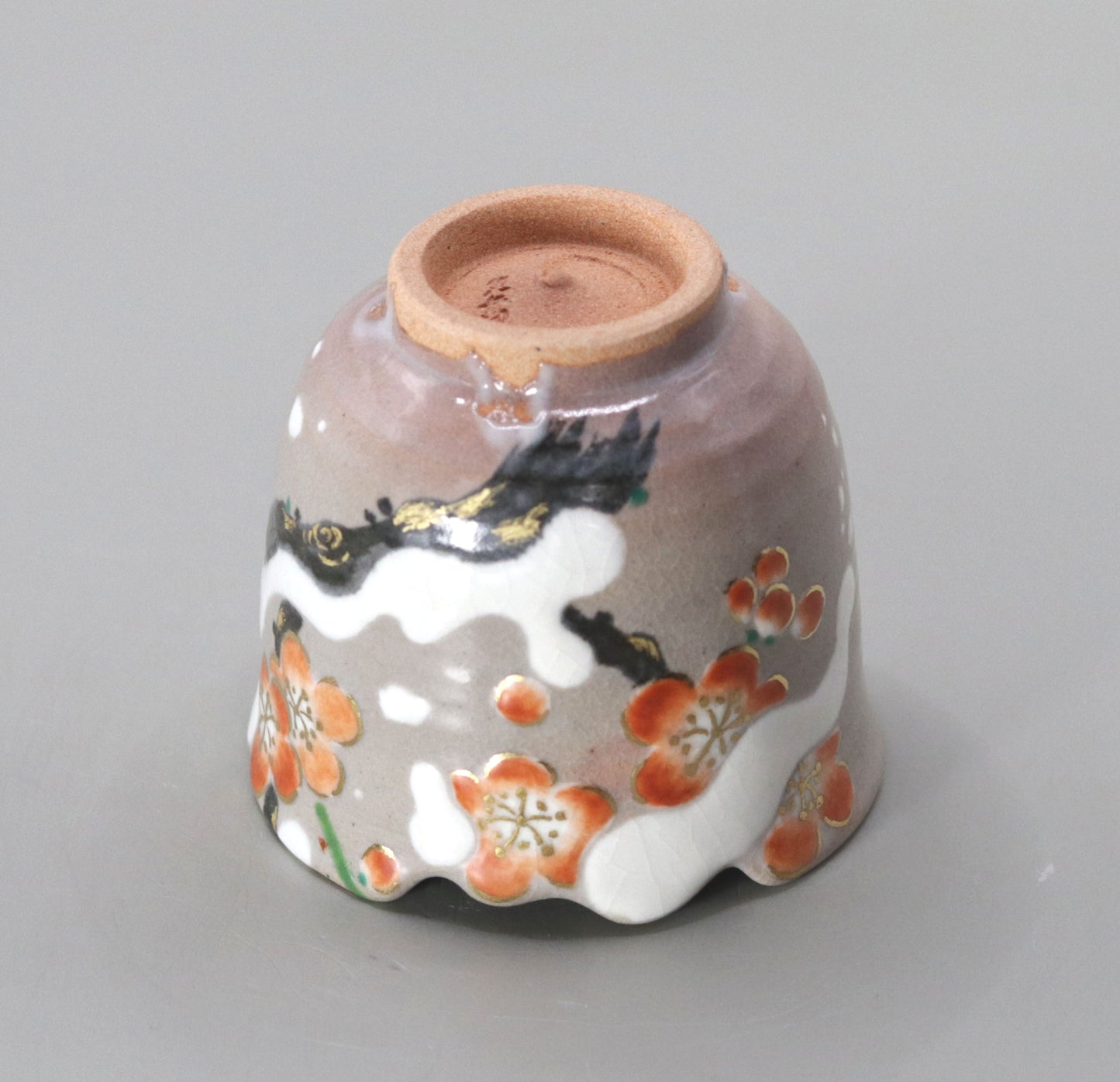 37. A copy of Kenzan's Snow-covered Plum Blossom Sake Cup by Kosai Miyagawa