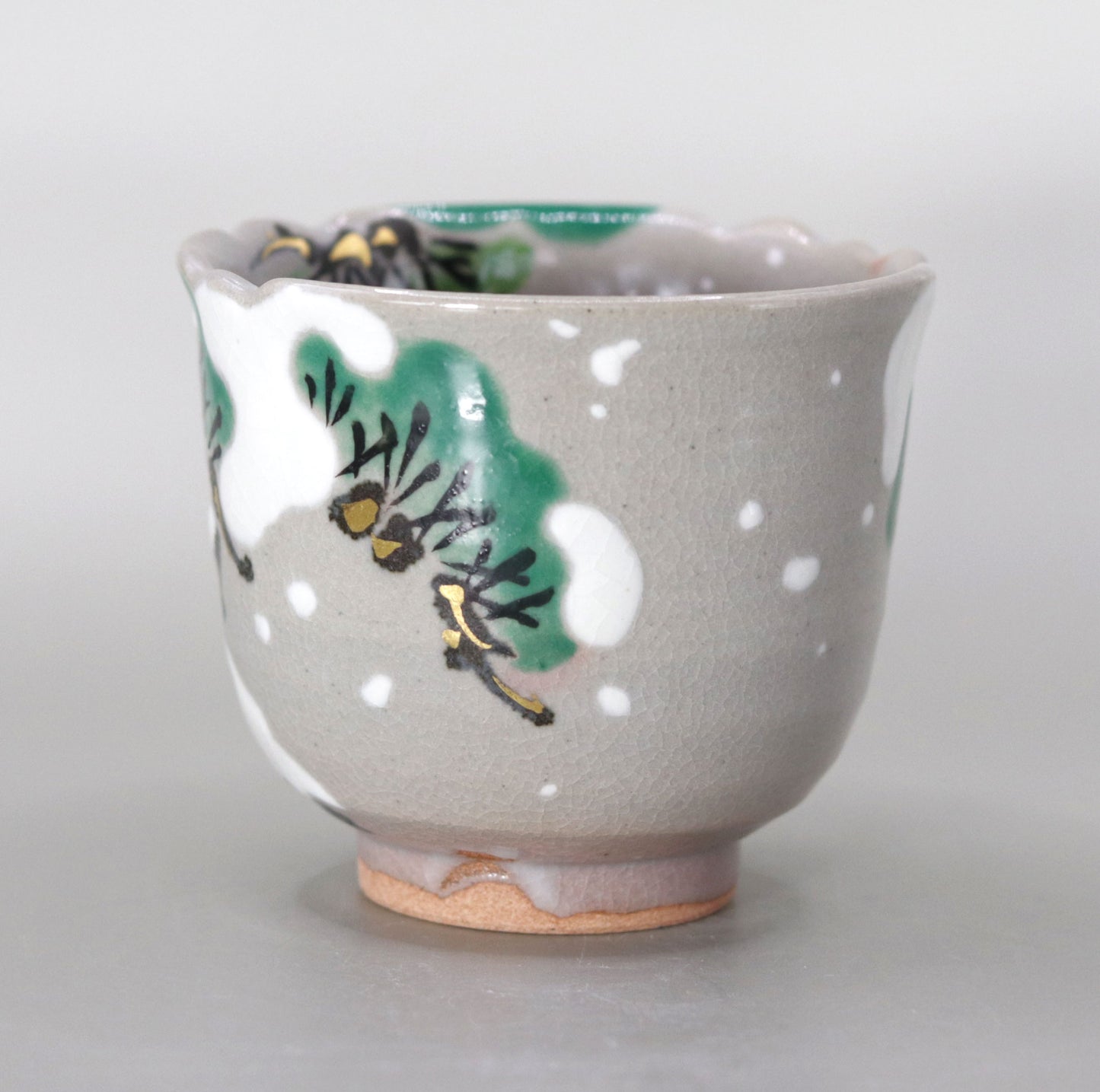 39. A copy of Kenzan's Snow and Pine Tree Sake Cup by Miyagawa Kosai