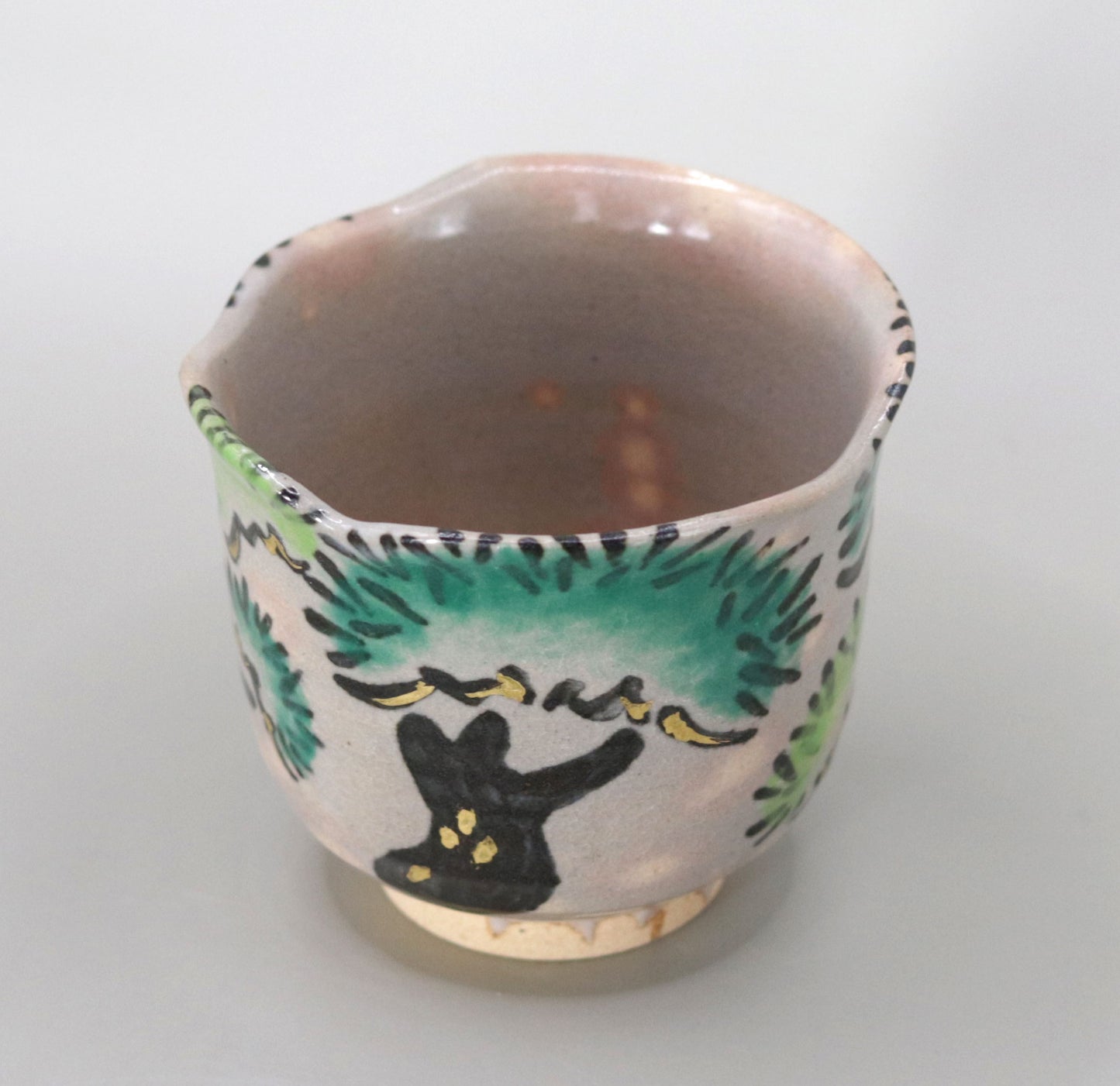 41. A copy of Kenzan's Old Pine Tree Sake Cup by Kosai Miyagawa