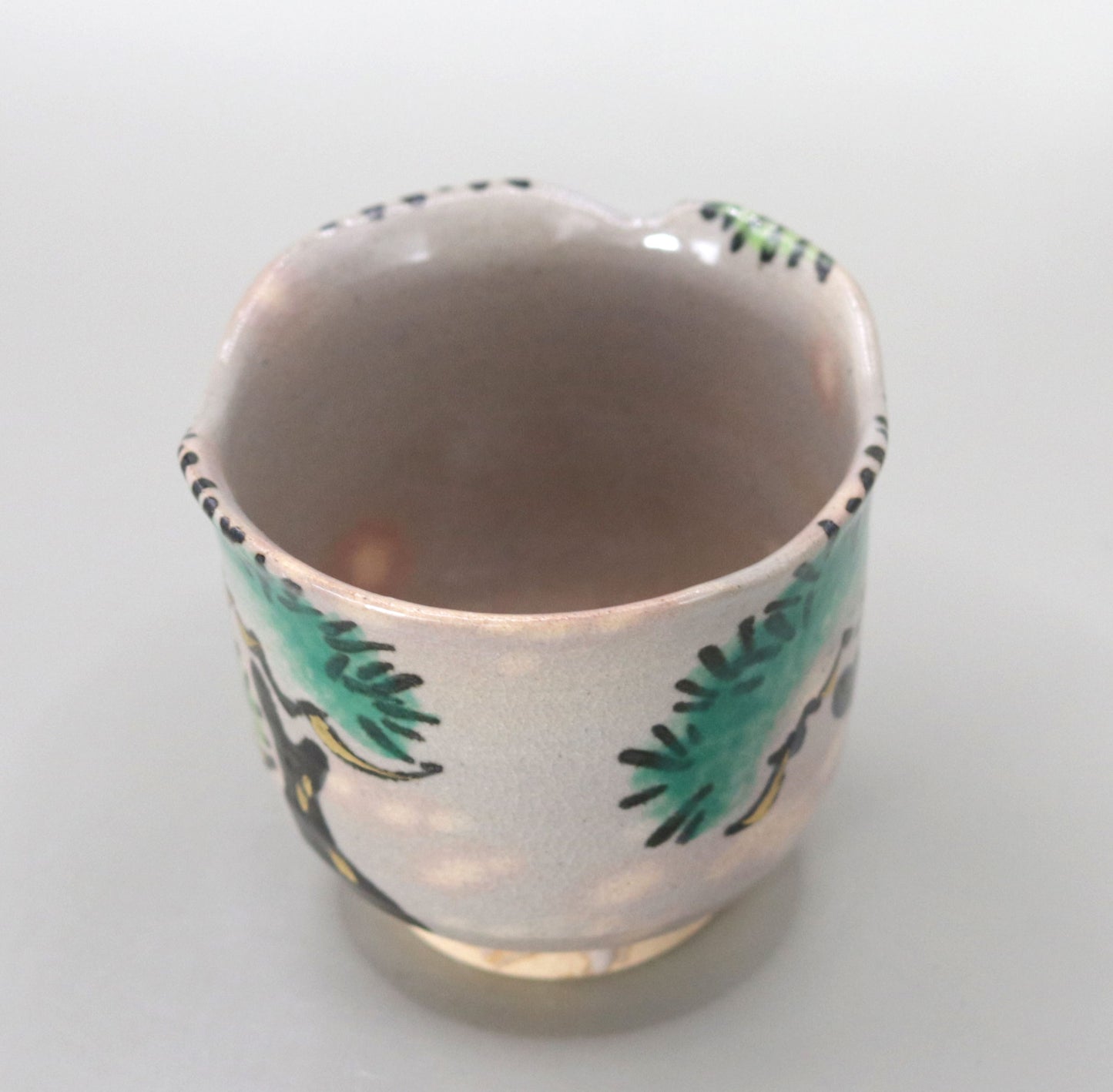 41. A copy of Kenzan's Old Pine Tree Sake Cup by Kosai Miyagawa