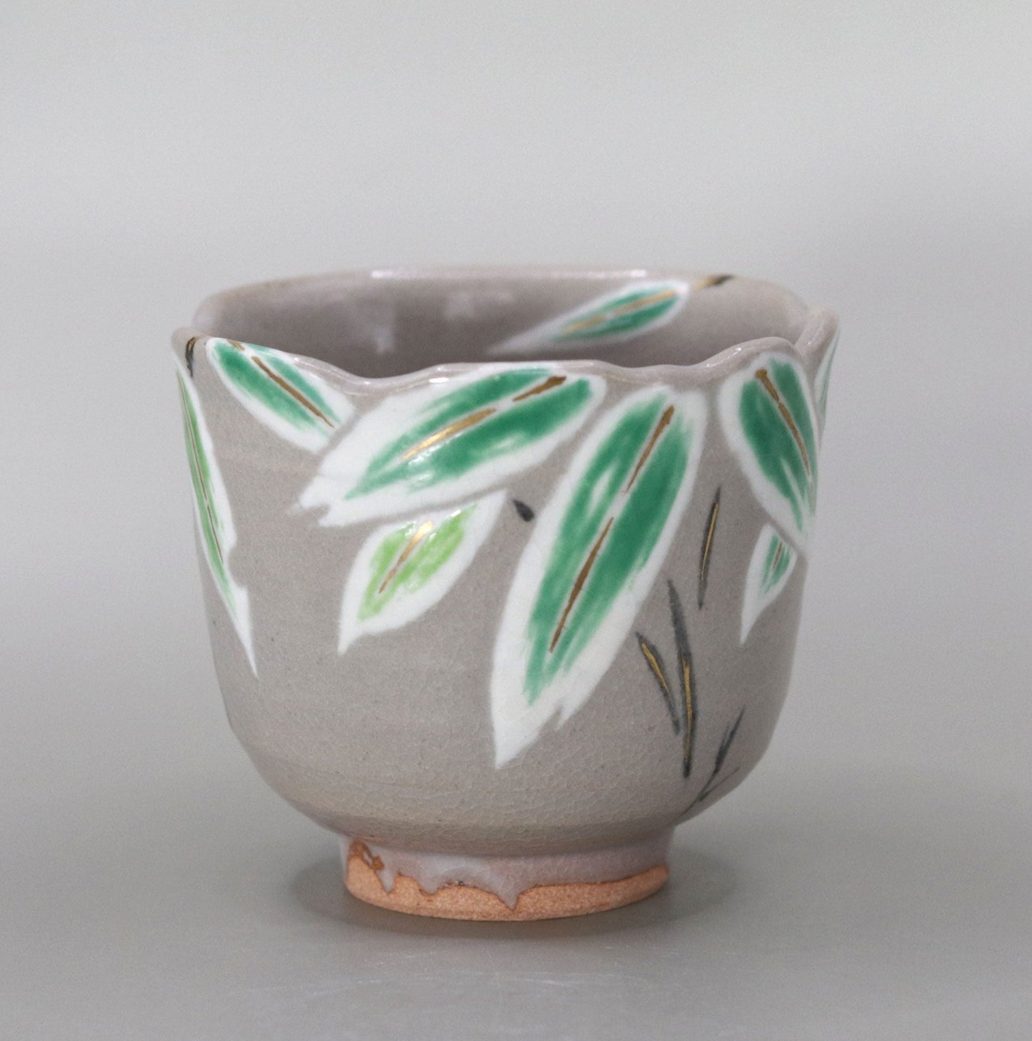 44. A copy of Kenzan's Kumazasa-no-e sake cup by Kousai Miyagawa