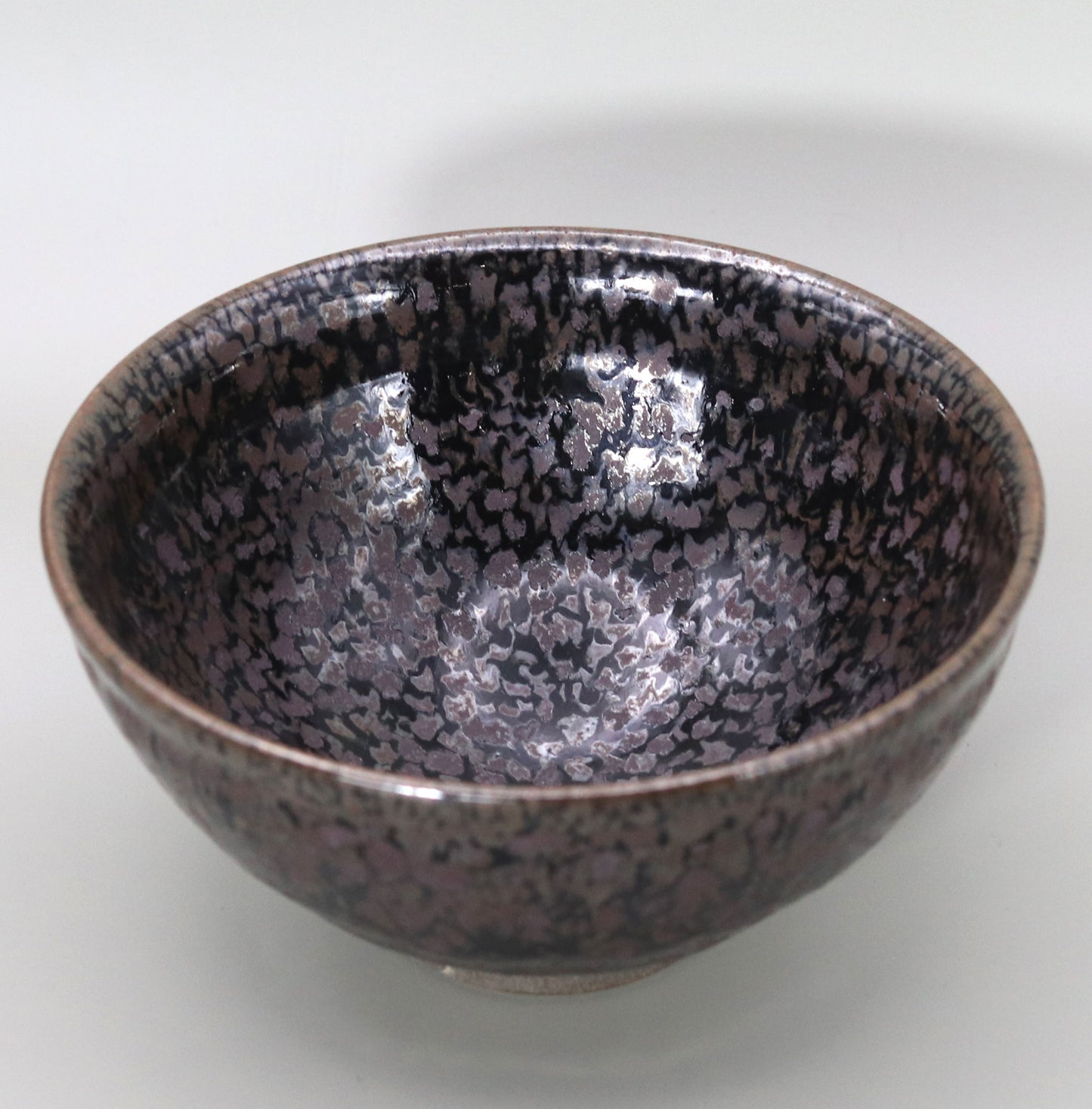 Black glazed tea bowl by Masahiro Ichino