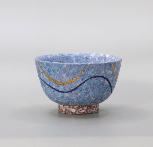 Blown mud gold and blue sake cup by Ichiji Shimizu