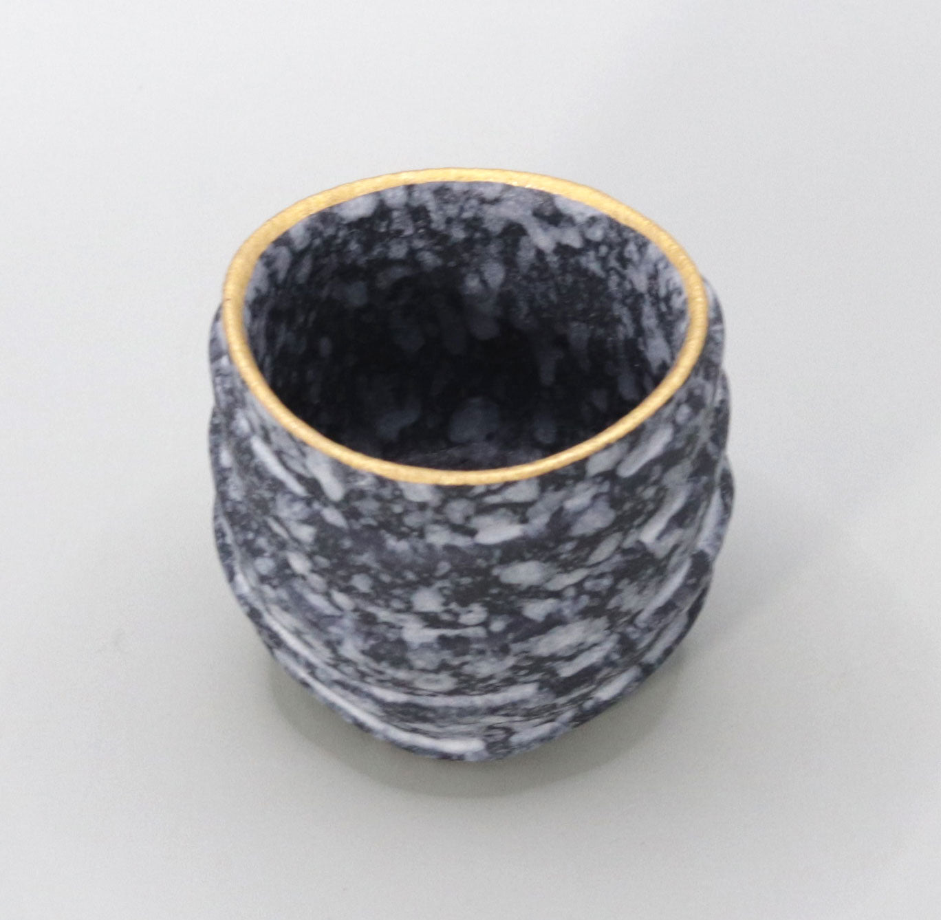 Gold-painted sake cup by Ichiji Shimizu