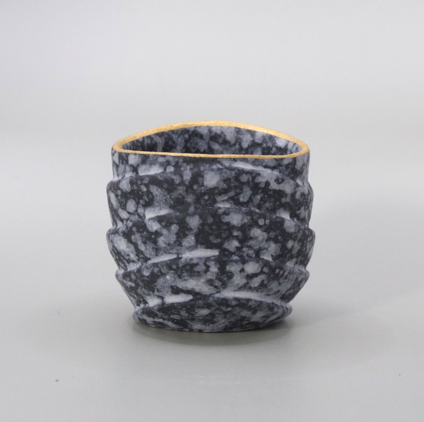 Gold-painted sake cup by Ichiji Shimizu