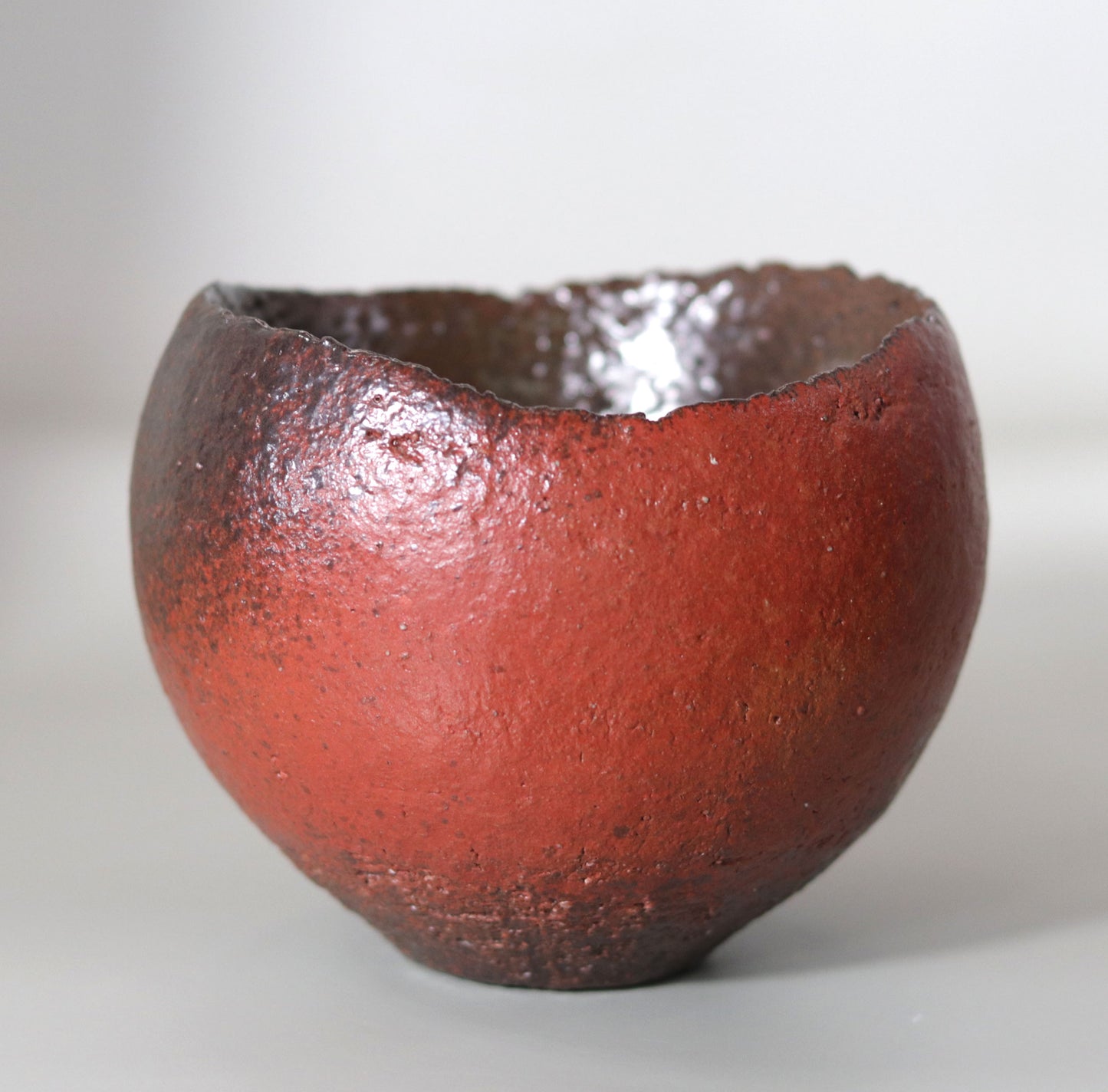 Tanba Red Concave Tea Bowl by Nishihata Tadashi