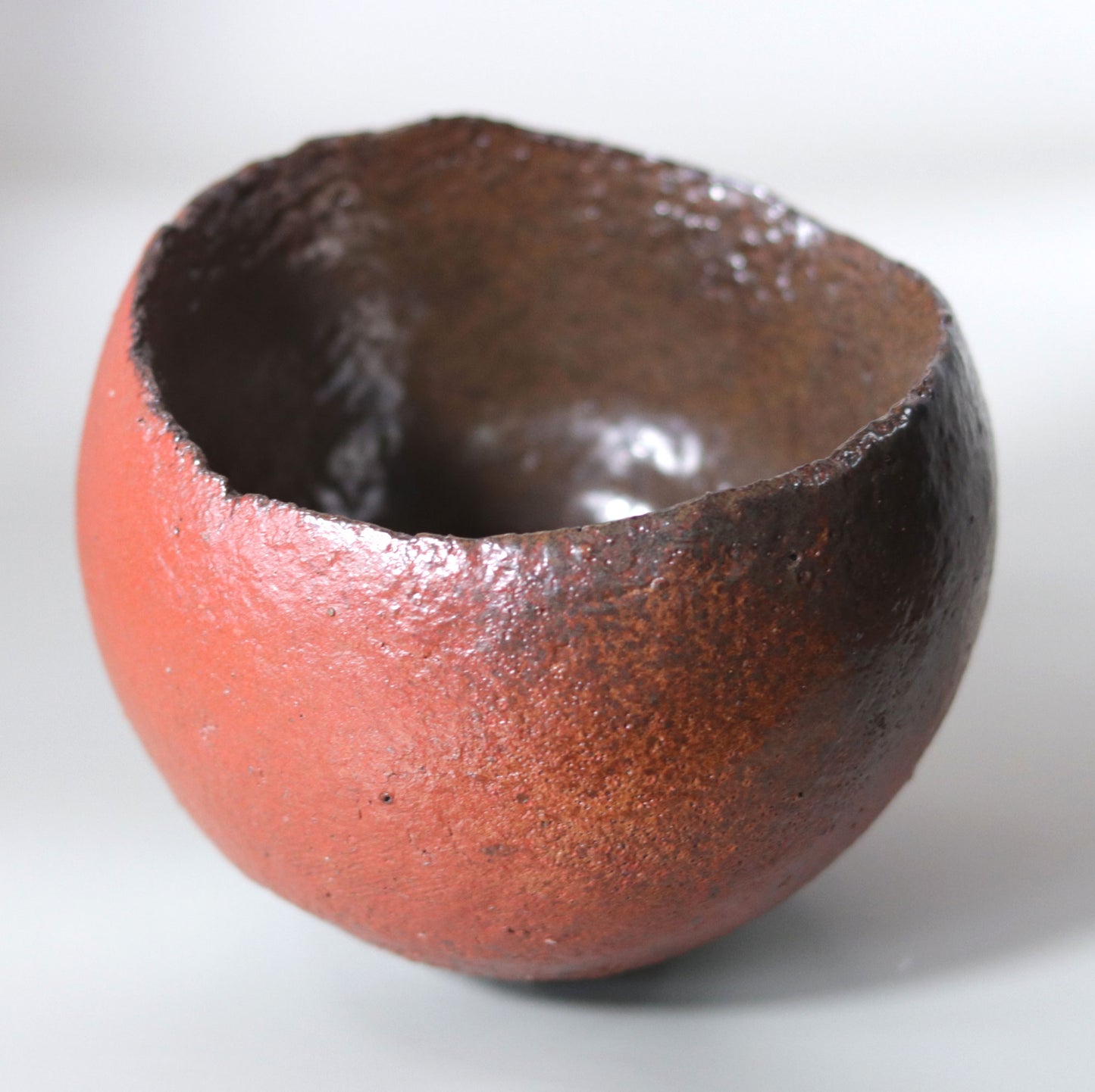 Tanba Red Concave Tea Bowl by Nishihata Tadashi