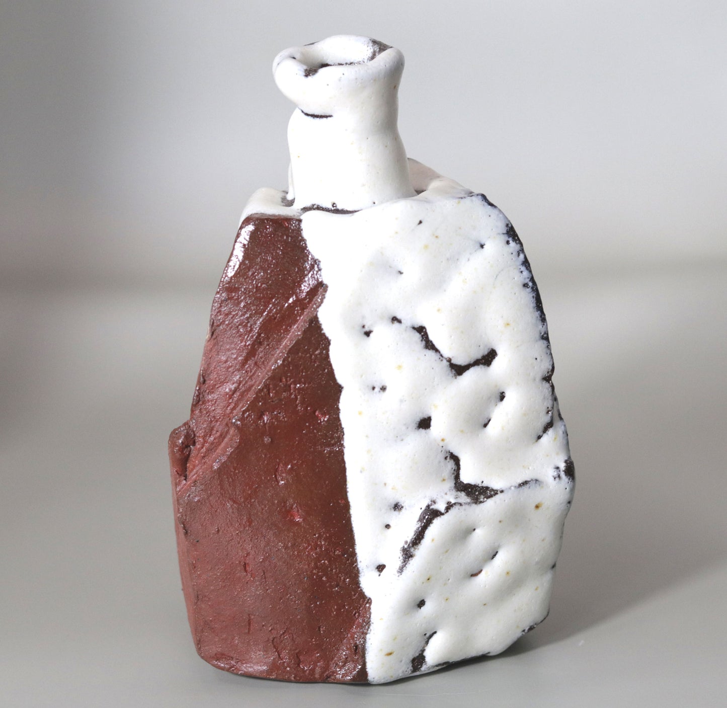 Tanba straw white glaze sake bottle by Nishihata Tadashi